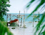 View of a suspended boat during Bora Bora road trip (John Beck).